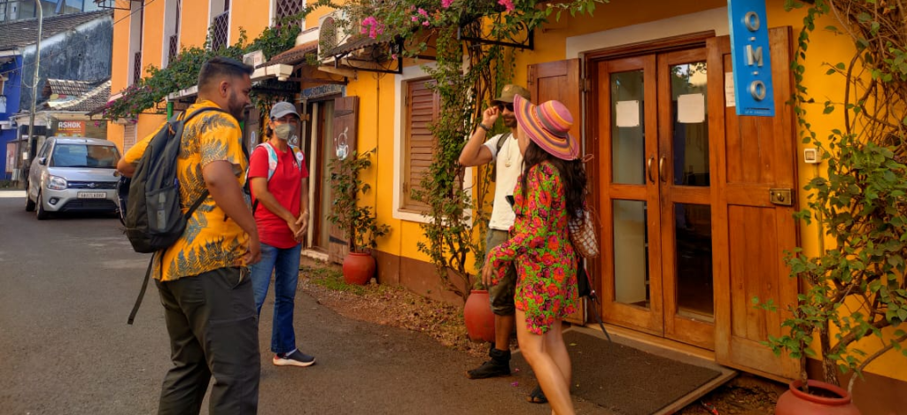 This photo shows the best time to visit Goa and tourists enjoying a sunny day in Fontainhas with Soul Travelling