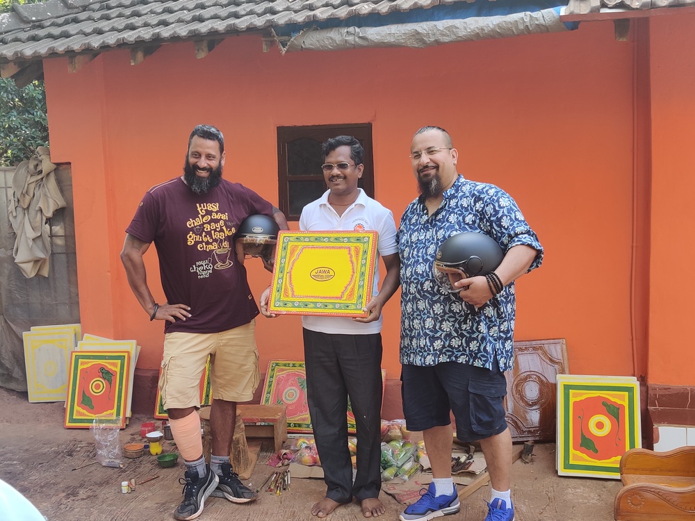 The image shows Rocky and Mayur in Goa exploring Goan chitari art