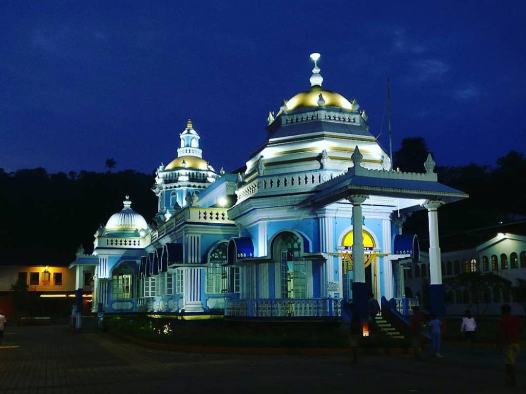 The image shows a popular temple in Goa the Mangueshi Temple in Ponda