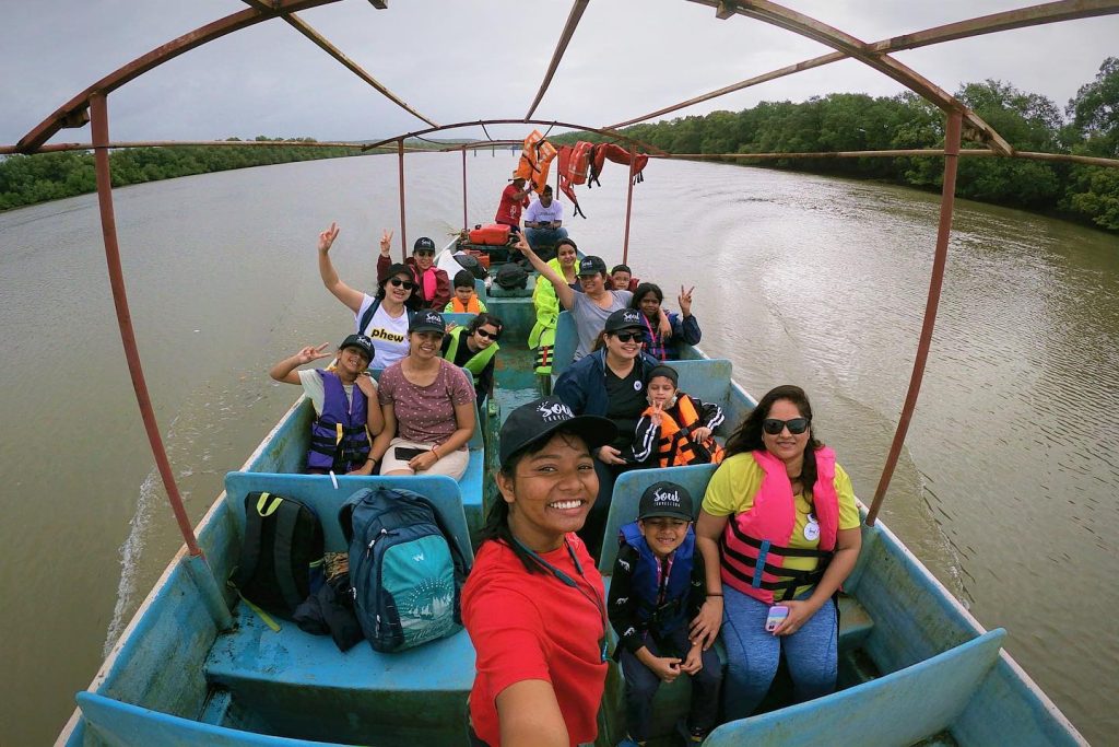 The image shows a family on a trip to Goa with kids