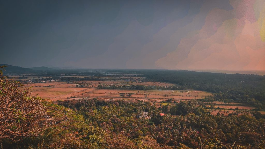 The image shows a view of village of Cansaulim with three kings church haunted