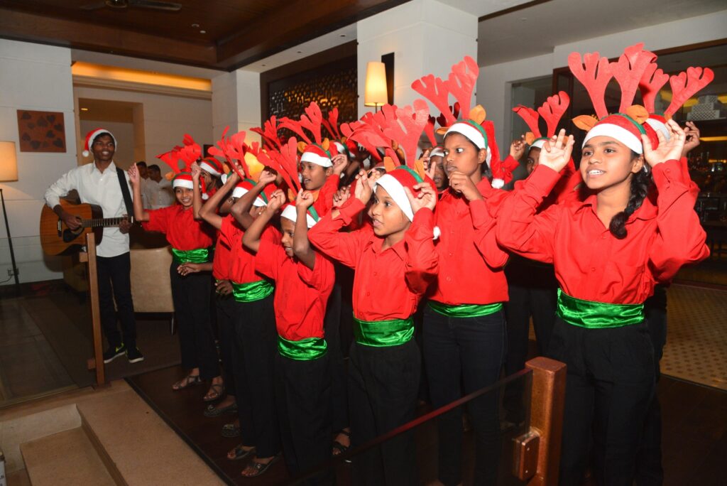 kids-from-bethesta-life-centre-singing-carols-at-the-christmas-tree-lighting-celebrations-at-grand-hyatt-goa-1